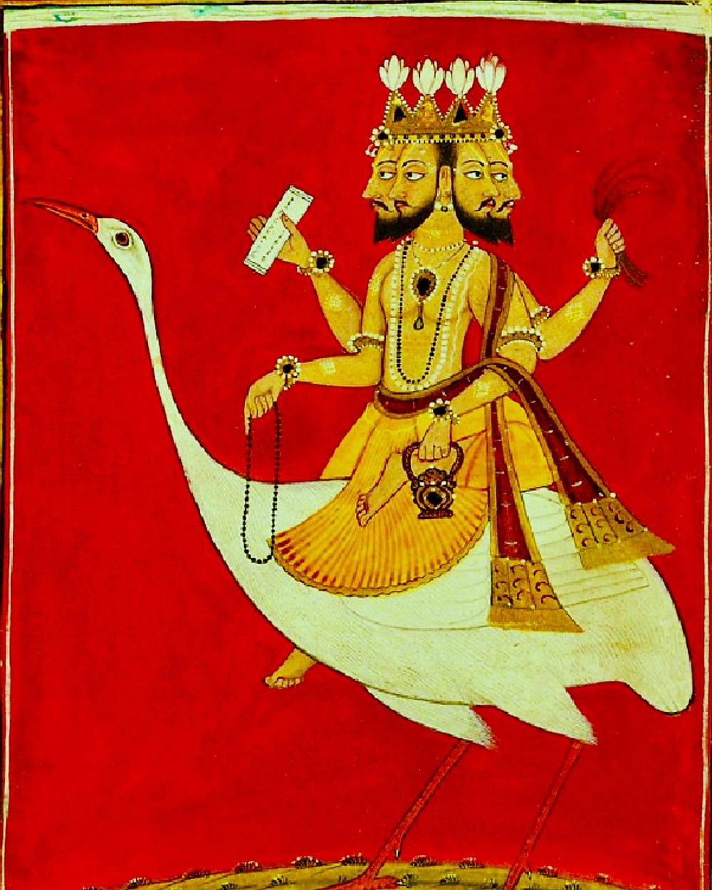 Four-faced Brahma in gold robes riding his white swan across a red ground, holding a manuscript, rosary and water-pot — a Pahari painting of about 1720.