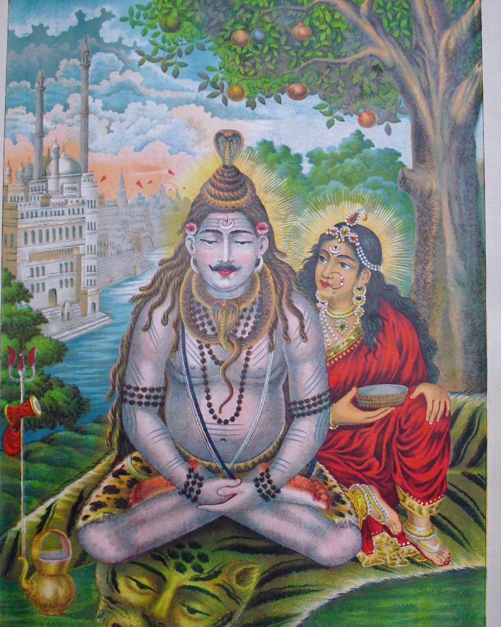 Shiva seated in meditation on a tiger skin, a cobra hood above his head, Parvati beside him and the ghats of Kashi (Benares) behind — a colour lithograph of about 1895.